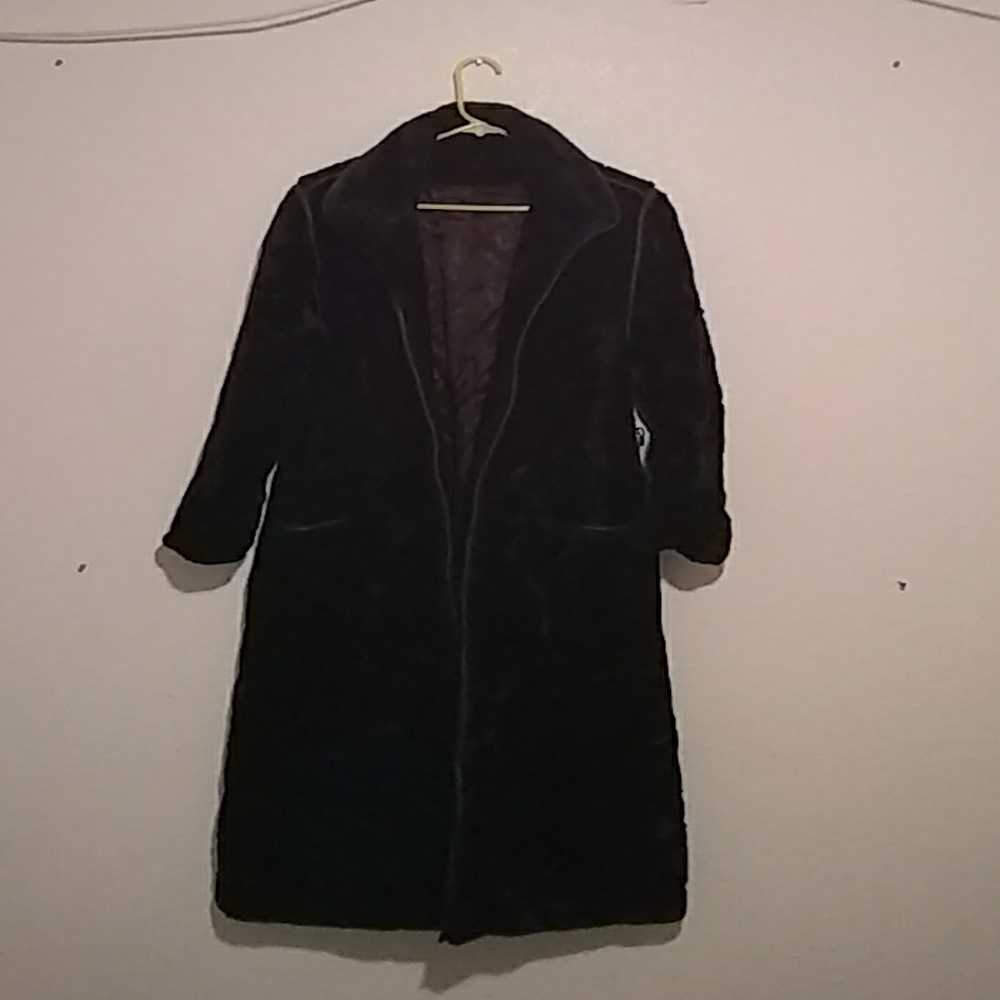 Sears coat that's furry w leather pockets